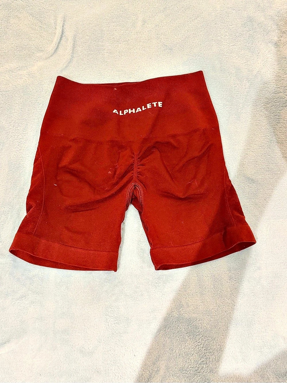 Alphalete Amplify Biker Shorts in Red